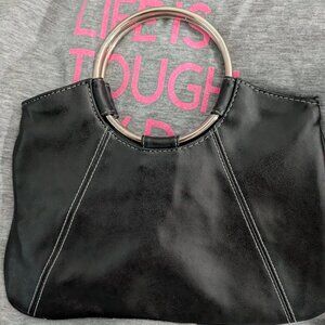 Geometric Black PVC handbag with white stitching and solid Metal Ring Handles. A